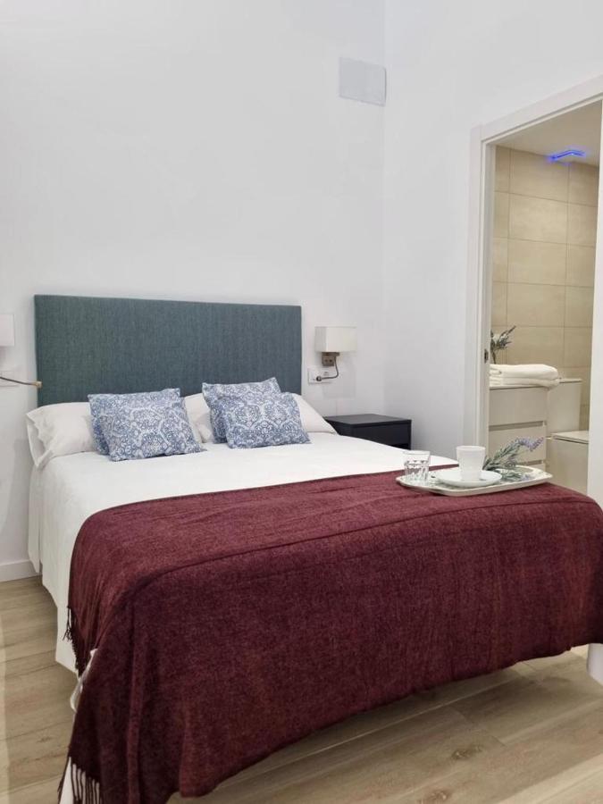 Apartamentos Rg Hospital Valme Sevilla Bagian luar foto