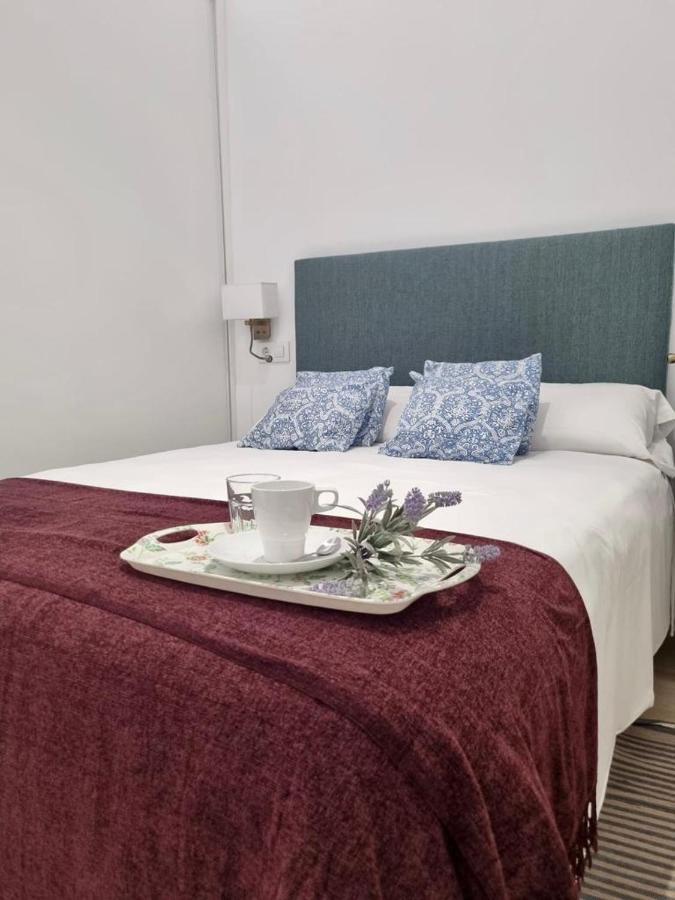 Apartamentos Rg Hospital Valme Sevilla Bagian luar foto