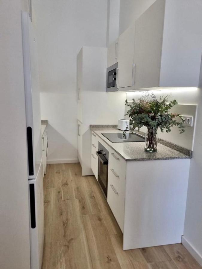 Apartamentos Rg Hospital Valme Sevilla Bagian luar foto