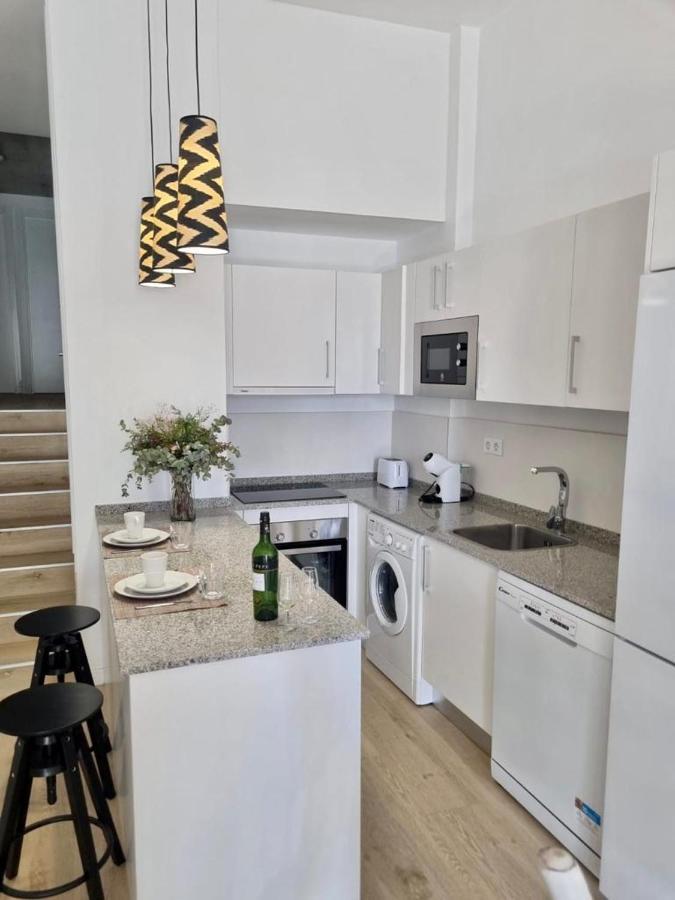 Apartamentos Rg Hospital Valme Sevilla Bagian luar foto